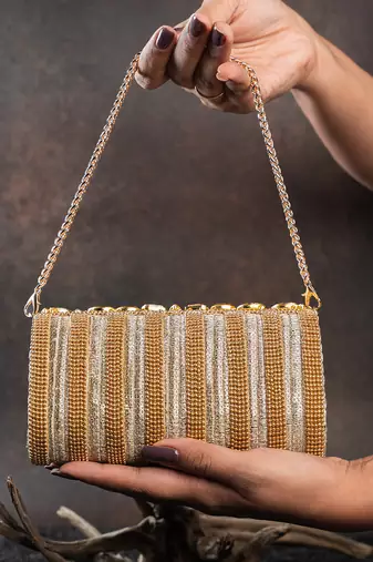 Gold kundan embroidered silk clutch