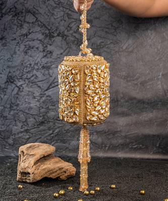 Gold kundan embroidered silk cylindrical bag 1