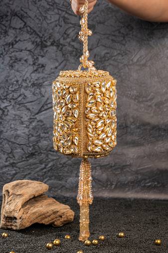 Gold kundan embroidered silk cylindrical bag