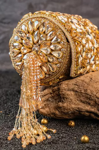 Gold kundan embroidered silk cylindrical bag