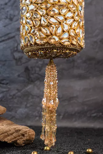 Gold kundan embroidered silk cylindrical bag
