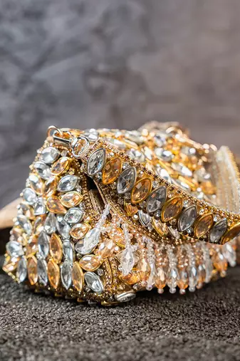 Dual tone diamond embroidered silk clutch