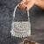 Silver diamond embroidered silk clutch
