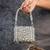 Silver diamond embroidered silk clutch