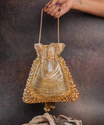 Gold hinted diamond embroidered silk potli bag 1