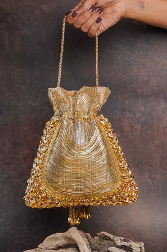 Gold hinted diamond embroidered silk potli bag