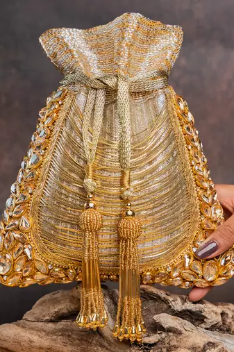 Gold hinted diamond embroidered silk potli bag
