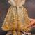 Gold hinted diamond embroidered silk potli bag
