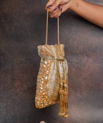 Gold hinted diamond embroidered silk potli bag 3