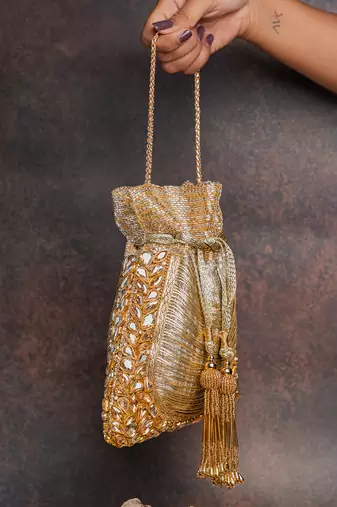 Gold hinted diamond embroidered silk potli bag