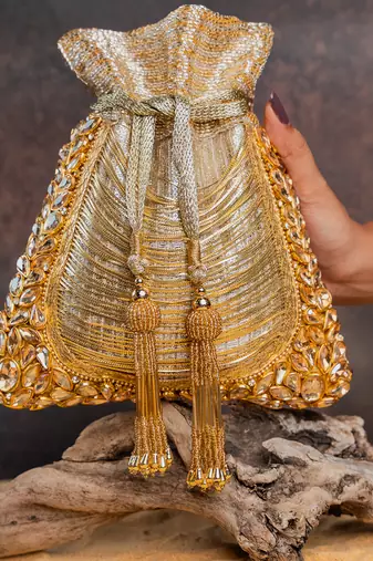 Gold hinted diamond embroidered silk potli bag