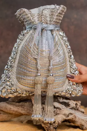 Silver hinted diamond embroidered silk potli bag