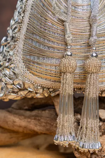 Silver hinted diamond embroidered silk potli bag