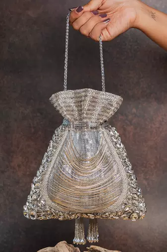 Silver hinted diamond embroidered silk potli bag