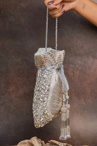 Silver hinted diamond embroidered silk potli bag