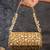Gold embroidered silk capsule clutch