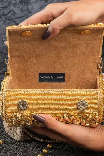 Gold embroidered silk capsule clutch