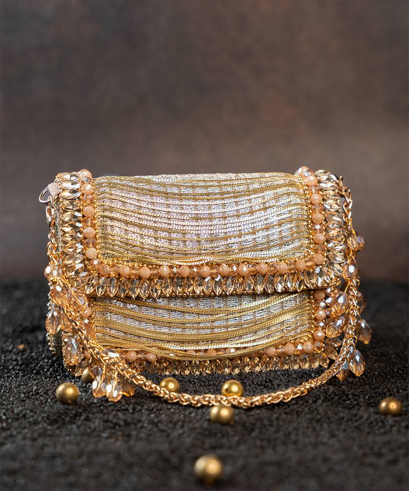 Slate gold hinted embroidered silk clutch