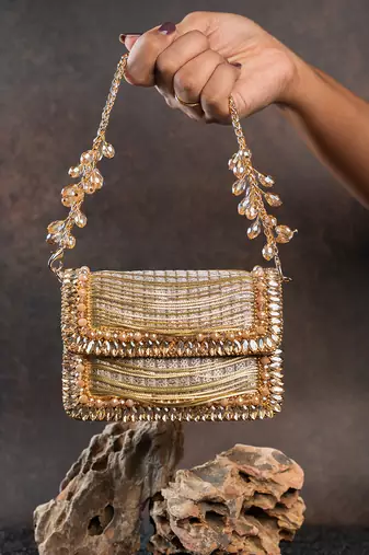 Slate gold hinted embroidered silk clutch