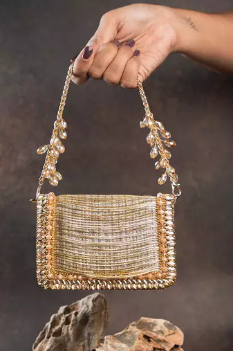 Slate gold hinted embroidered silk clutch