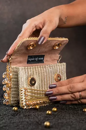 Slate gold hinted embroidered silk clutch