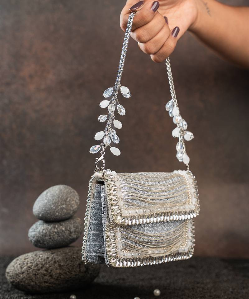 Slate silver hinted embroidered silk clutch