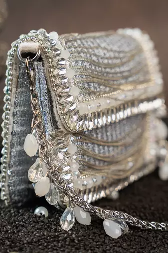 Slate silver hinted embroidered silk clutch