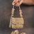 Slate gold hinted embroidered silk mini clutch