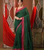 Green cotton sequence work soft saree with contrast border
