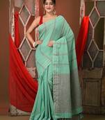 Sea green cotton saree with stripes design