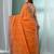 Orange cotton saree with stripes border