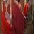 Red cotton saree with sequined pallu