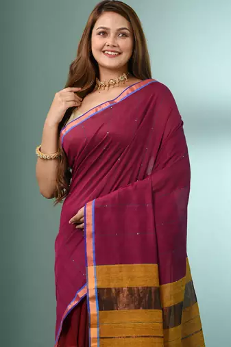 Magenta cotton saree with sequine work and zari stripe pallu
