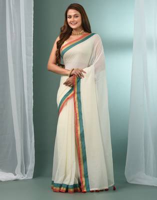 Off white solid mulmul soft saree 1