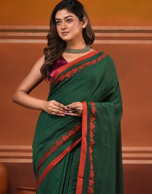 Green cotton soft saree with woven heart borders 5