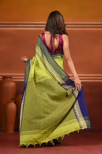 Lime green and navy blue cotton saree with geometric woven border