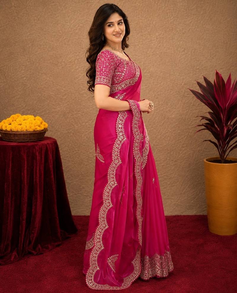 Rani pink soft shimmer chiffon embroidery work saree with unstitched blouse piece