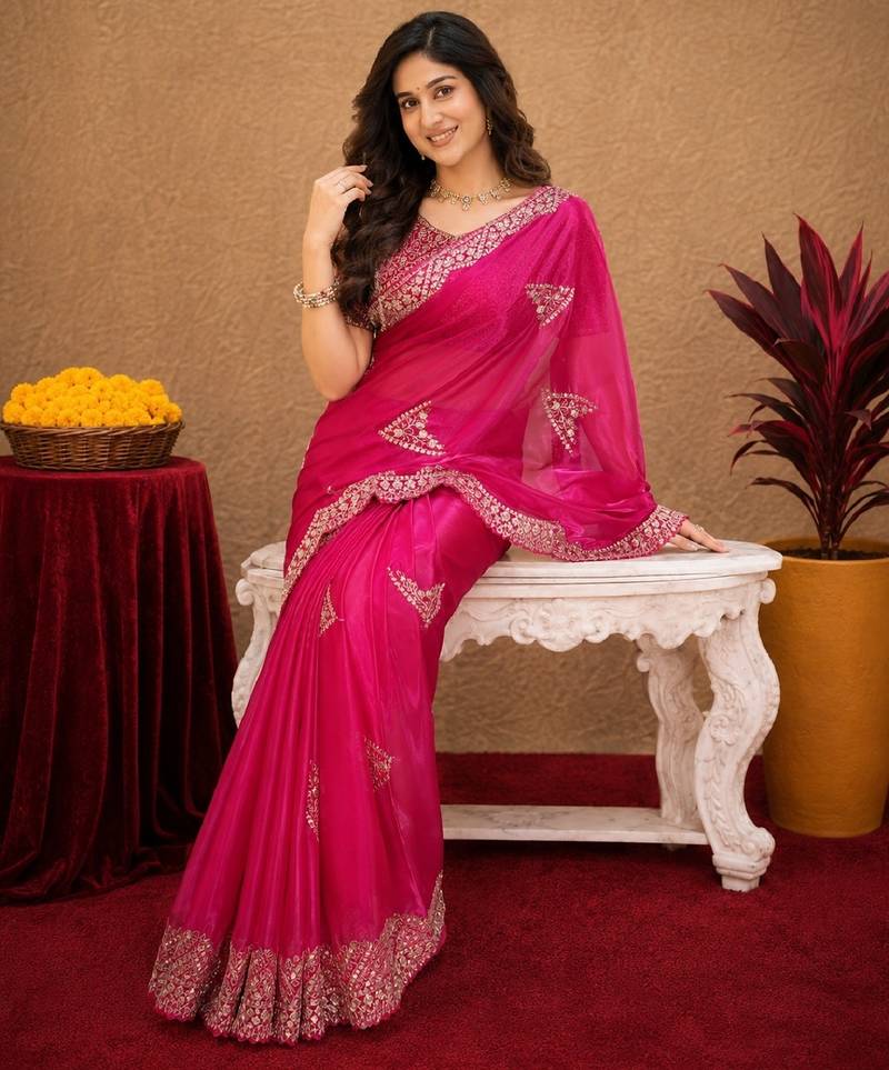 Rani pink soft shimmer chiffon embroidery work saree with unstitched blouse piece