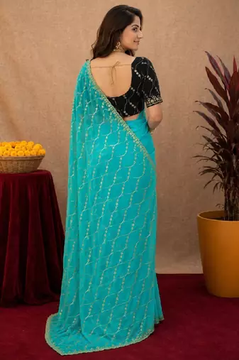 Rama  soft net sequence emboidery saree with unstitched blouse piece