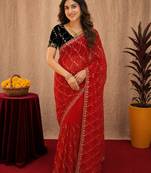Red  soft net sequence emboidery saree with unstitched blouse piece