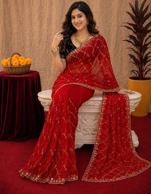 Red  soft net sequence emboidery saree with unstitched blouse piece 4