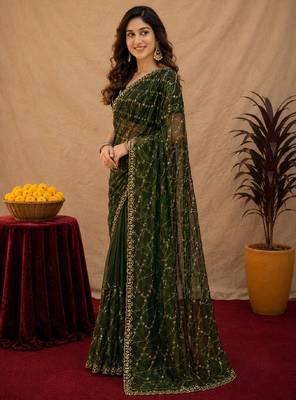 Green  soft net sequence emboidery saree with unstitched blouse piece 3