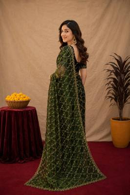Green  soft net sequence emboidery saree with unstitched blouse piece 4
