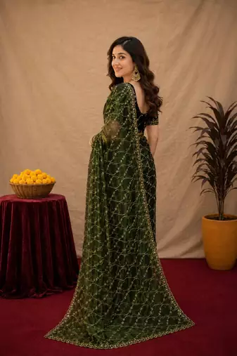 Green  soft net sequence emboidery saree with unstitched blouse piece