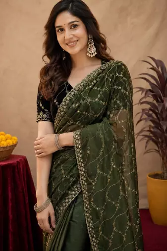 Green  soft net sequence emboidery saree with unstitched blouse piece