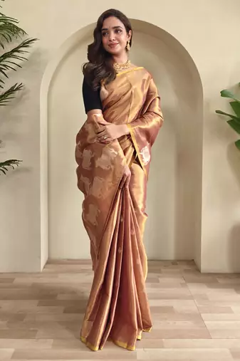 light orange coloer Zari All Over Pichwai Pattern Tilak Butti Motifs tissue saree