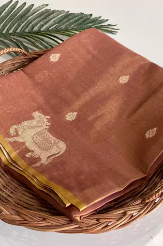 light orange coloer Zari All Over Pichwai Pattern Tilak Butti Motifs tissue saree