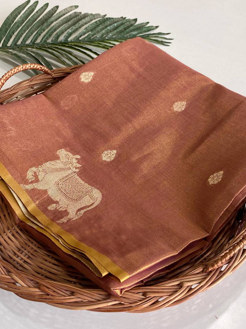 light orange coloer Zari All Over Pichwai Pattern Tilak Butti Motifs tissue saree
