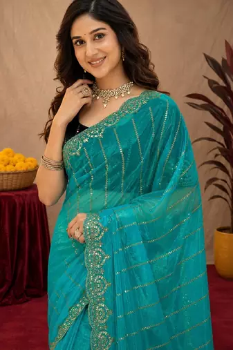 Rama  soft net sequence emboidery saree with unstitched blouse piece