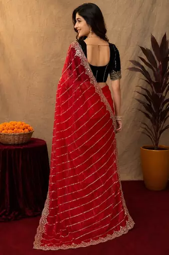 Red  soft net sequence emboidery saree with unstitched blouse piece